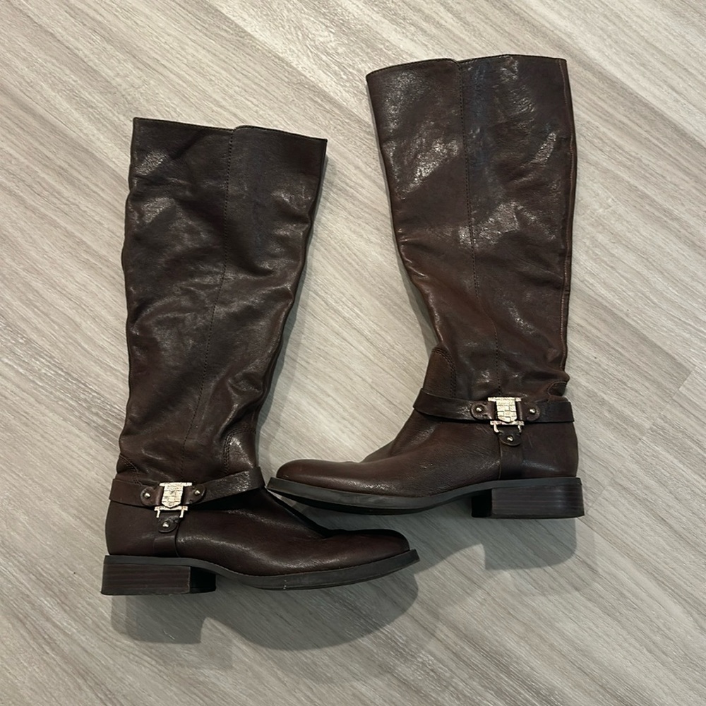 Dark brown leather below the knee boots